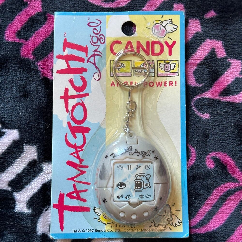 Vintage 1997 Tamagotchi Angel Candy Virtual Pet Keychain new in box